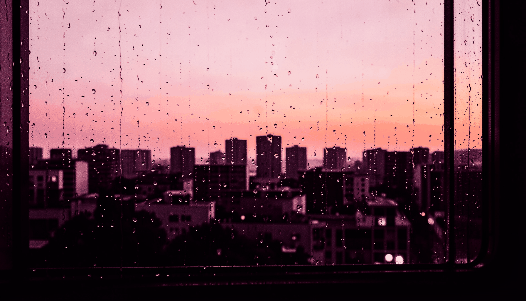 A sultry duotone photograph of a city skyline at twilight seen through a rain-streaked window, rendered in deep plum and pale rose